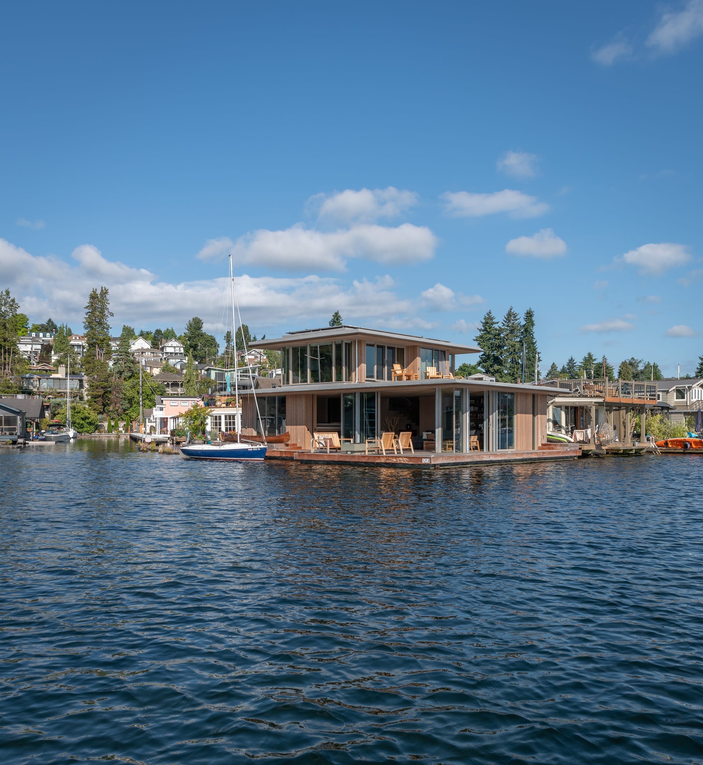 The carpenter built a floating home in the water.