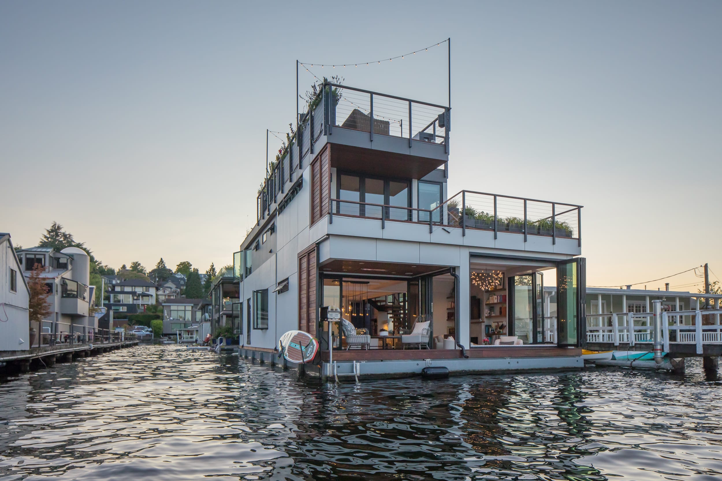 A floating home on a boat in the water.