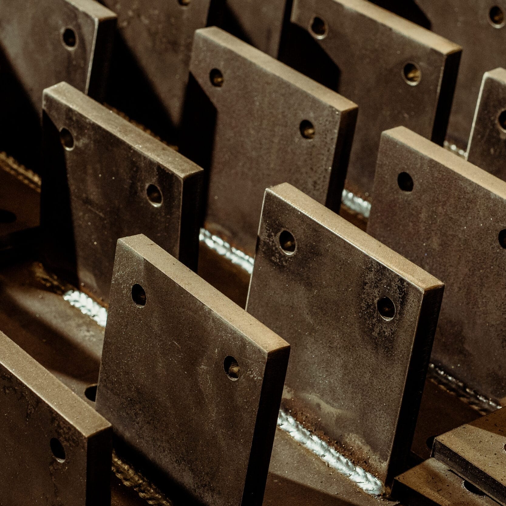 A row of metal plates in a Dyna Metal Fabricators factory.