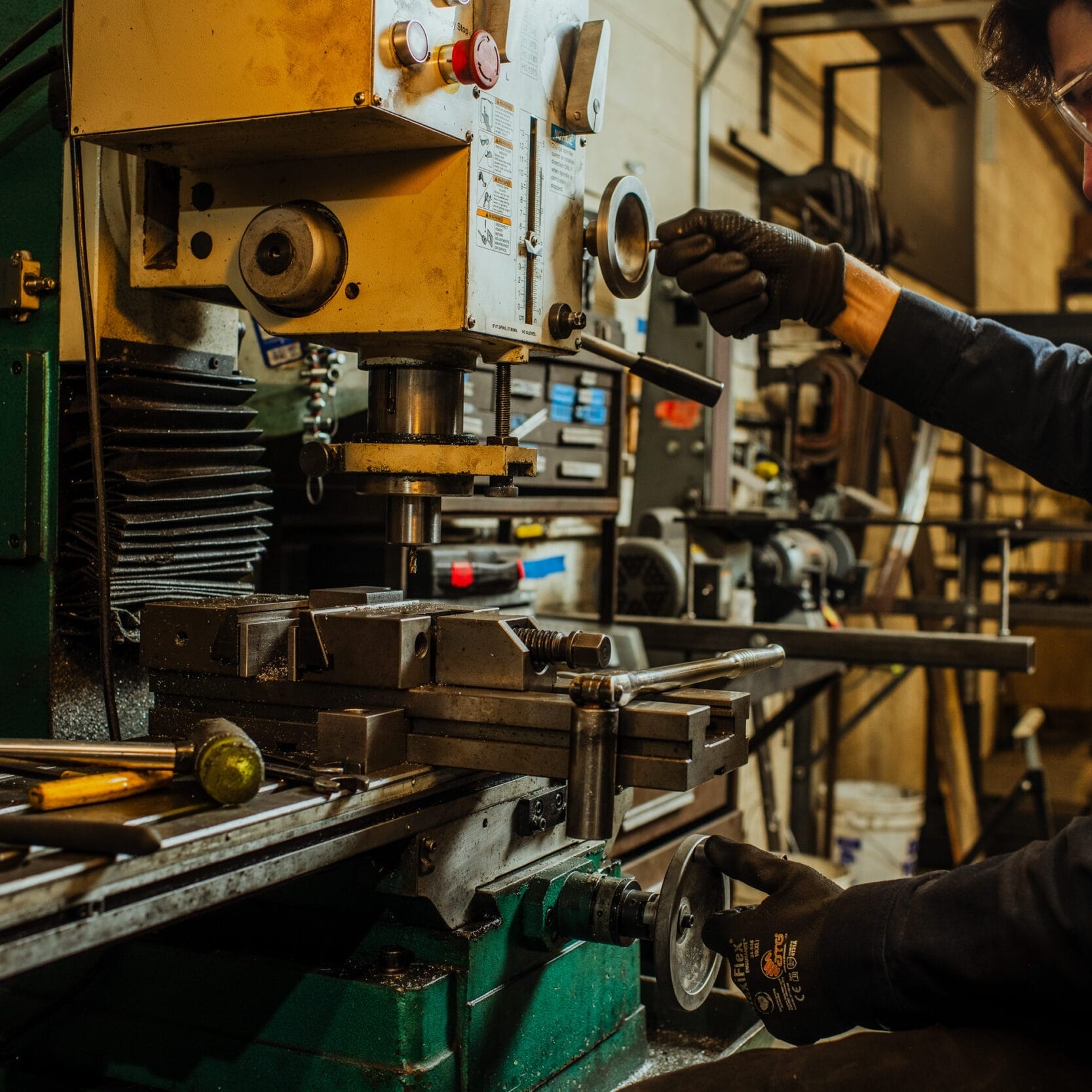 A man working on a machine at Dyna Metal Fabricators.